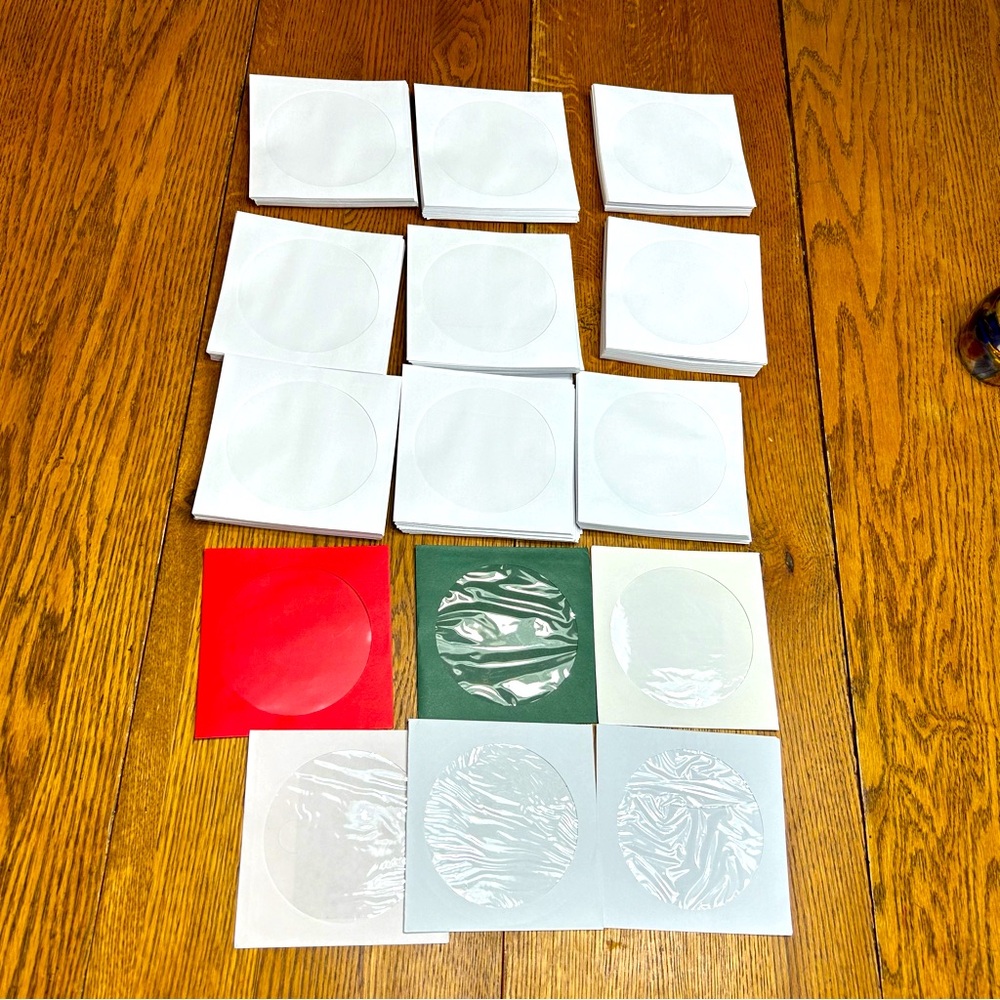 CD/DVD Sleeve Bundle - 182 qty of them .  Great for storage or crafting.